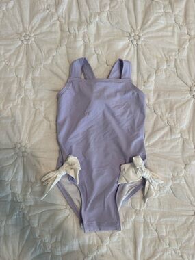 The Beaufort Bonnet Company Lilac One-Piece Swimsuit with White Side Bows